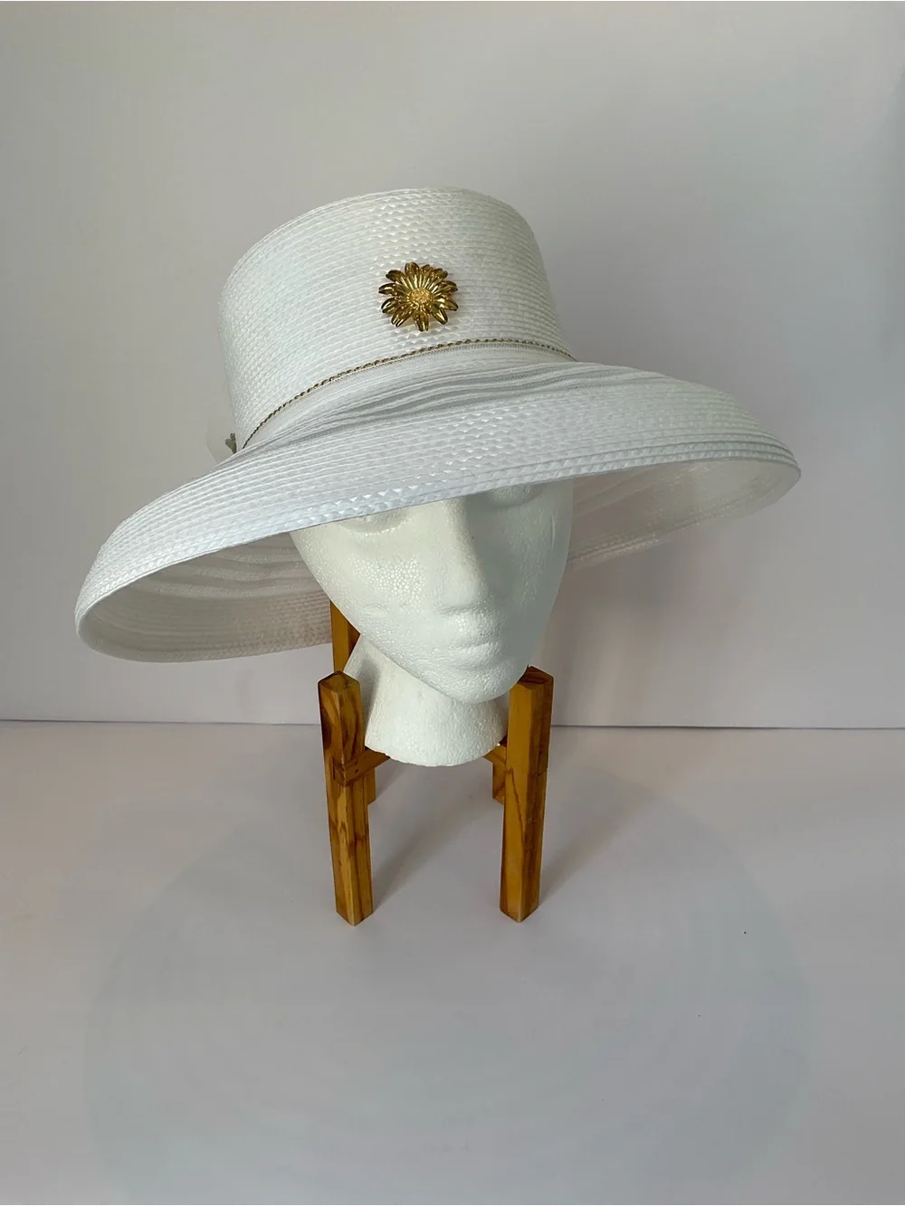 Elegant White Wide-Brim Church Hat with Net Lace Bow and Gold Floral Accent